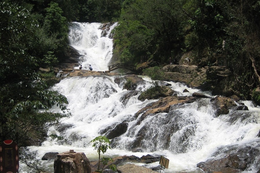 Admire the majestic beauty of the waterfall