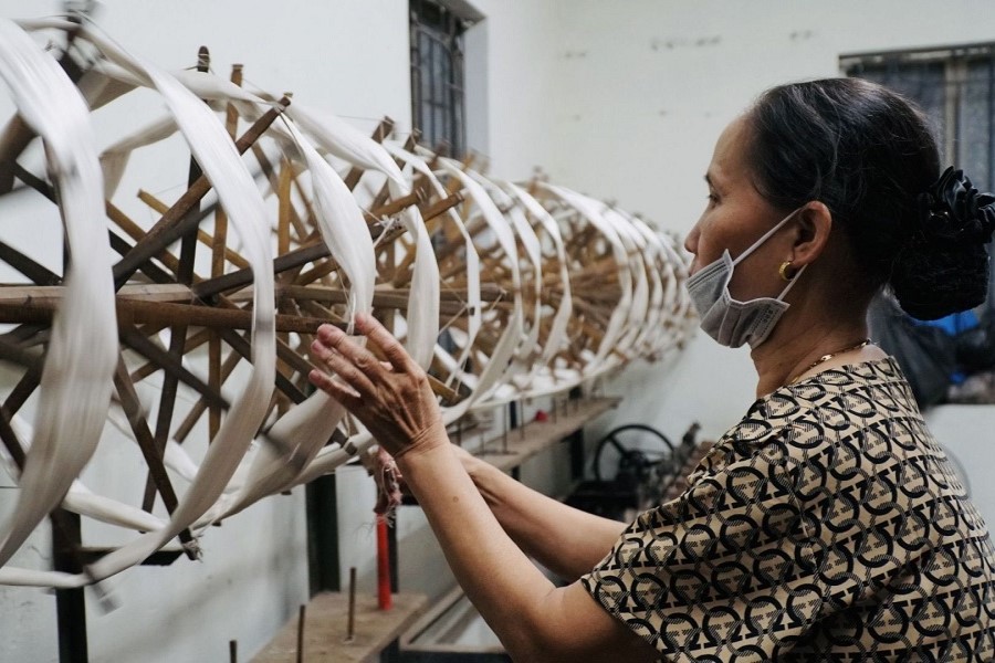 The artisans in Nha Xa Silk Village have preserved their techniques for generations