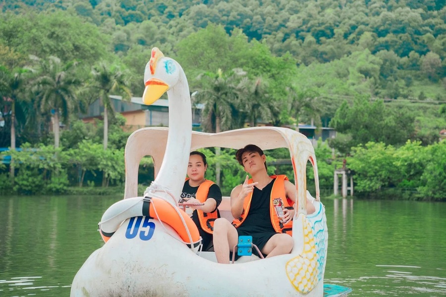 Ride a duck paddle boat in Vi Xuyen Lake