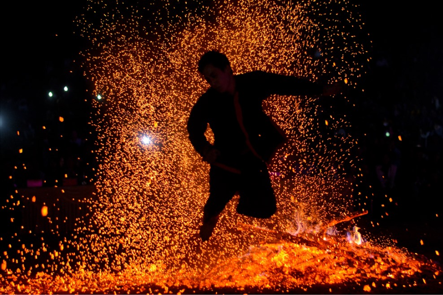 One of the most captivating spiritual rituals on a Ha Giang Cultural Tour is the Pa Then fire dance