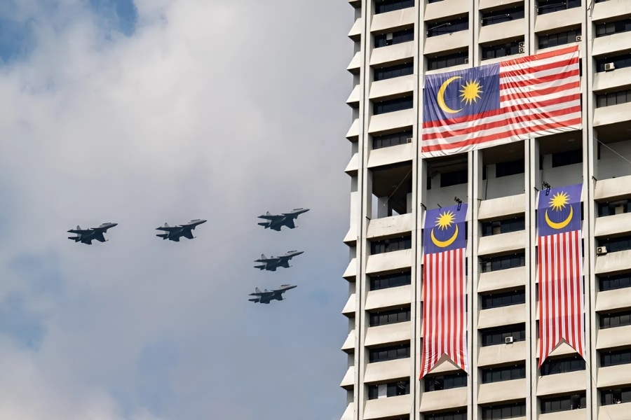 An air show is staged by the Malaysian airforce during the main celebration event of the National Day at the historical Dataran Merdeka, or Independence Square, in Kuala Lumpur, Malaysia, Aug. 31, 2022