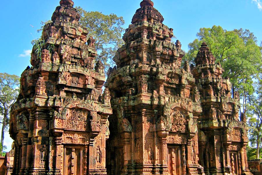 Banteay Srei is characterized by its relatively compact size compared to some of the larger temples in the Angkor region