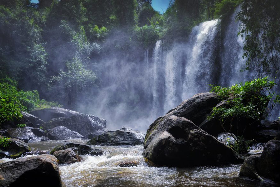 The Phnom Kulen Waterfall, a captivating natural wonder nestled within Phnom Kulen National Park near Siem Reap, Cambodia, stands as a prominent attraction