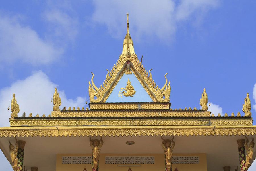 The gable pediments at Wat Leu Pagoda in Sihanoukville, Cambodia, are architectural elements that enhance the temple's visual allure