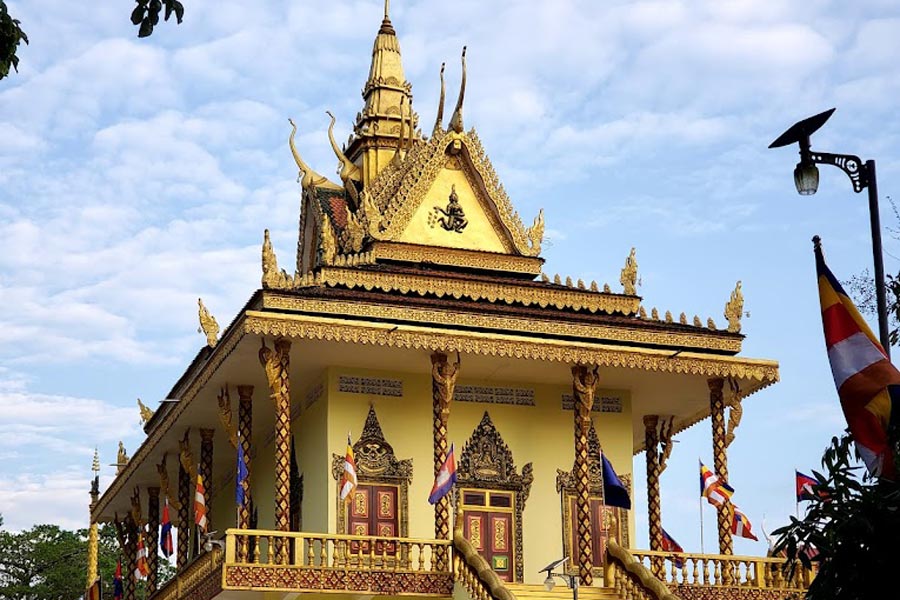 The roof tiers of Wat Leu Pagoda in Sihanoukville, Cambodia, exemplify traditional Khmer temple architecture