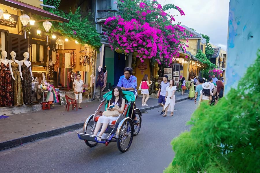 Along Tran Phu Street, locals grow bougainvillea in a variety of vibrant colors 