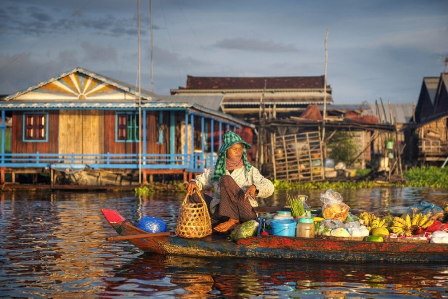 The Kampong Chhnang floating village with boats filled with goods