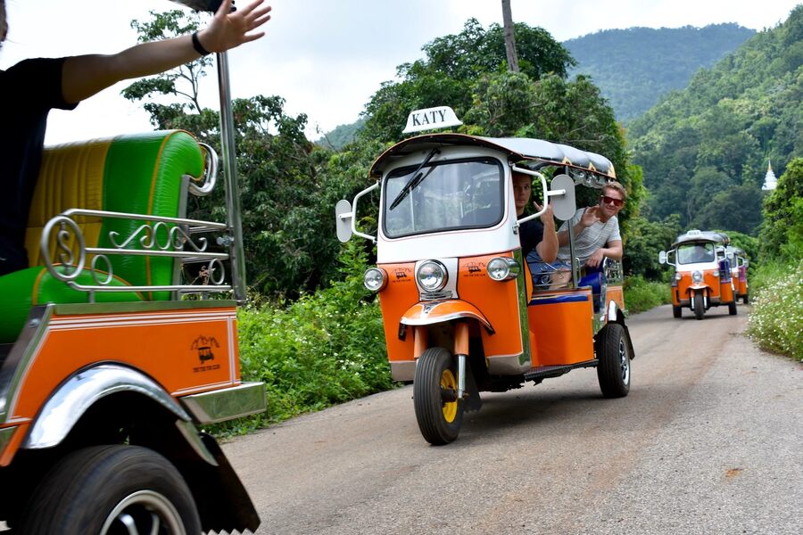 Tourists tuk tuk market