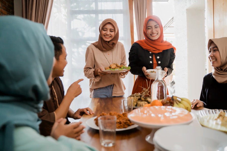 Malaysian people visit their friends to exchange gifts, share meals, and reconnect with each other 