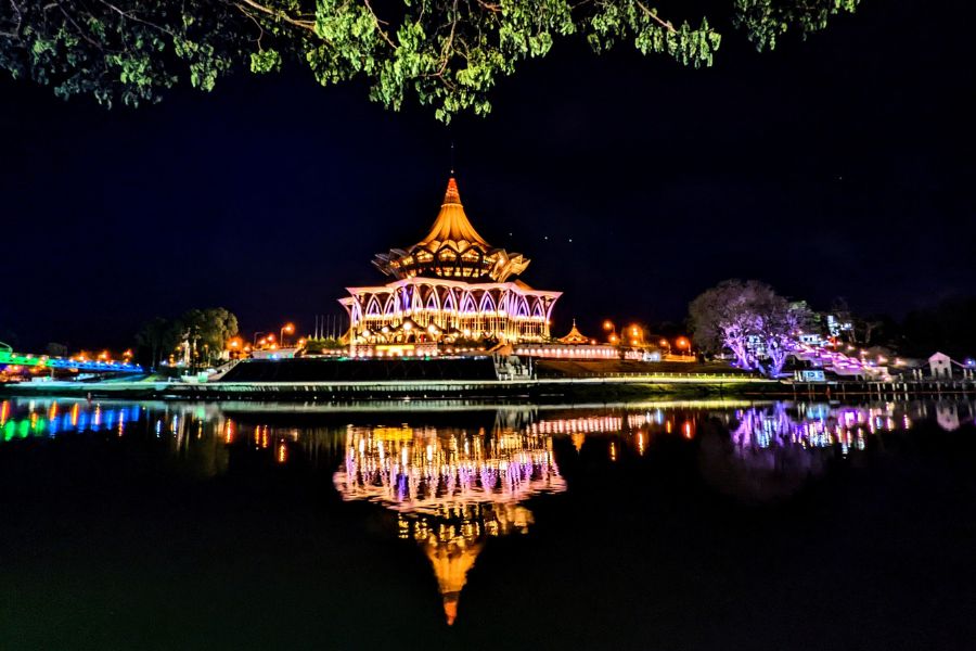 The colorful Kuching Waterfront by night in Sarawak