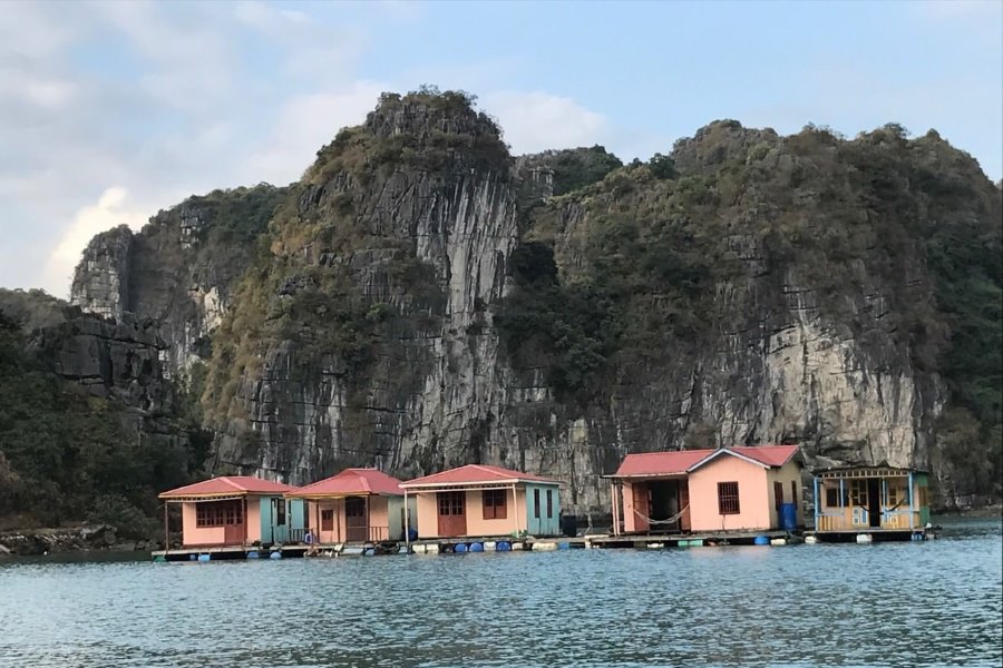 Houses nestled against the mountains in Vung Vieng