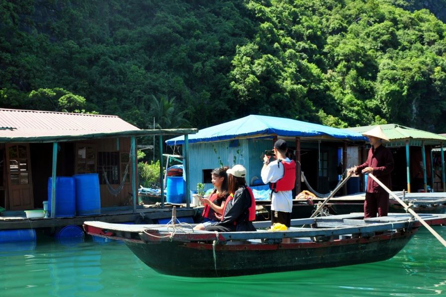 Explore the floating houses on the bay