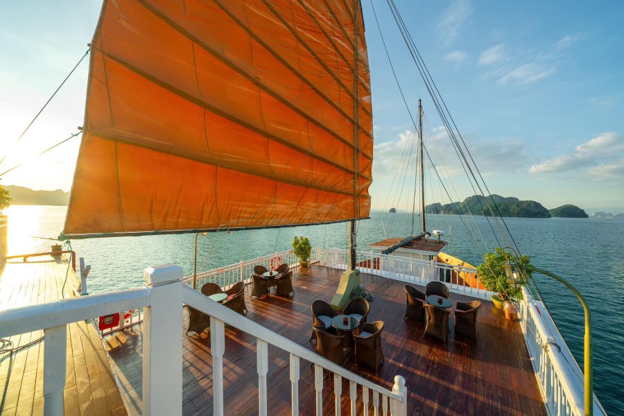 Enjoy the sunset on the sundeck of Halong Cruise