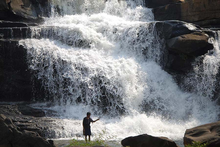 Visit Tad Lo and explore the beautiful waterfall