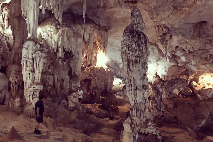Climb the steep steps to reach the mysterious cavern full of shrines, stalactites, stalagmites and bats