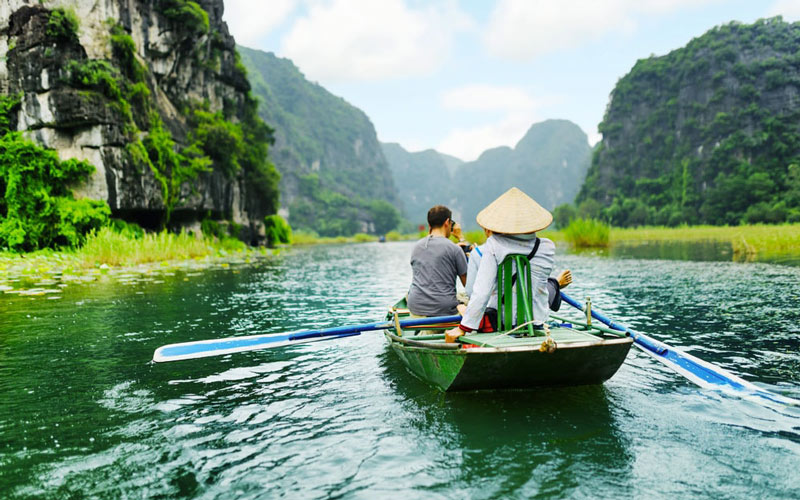 Tourists in Rowboats at Tam Coc