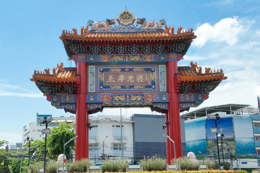 The Chinatown Gate is situated at the intersection of Odeon Circle and Yaowarat Road, marking the entrance to Chinatown