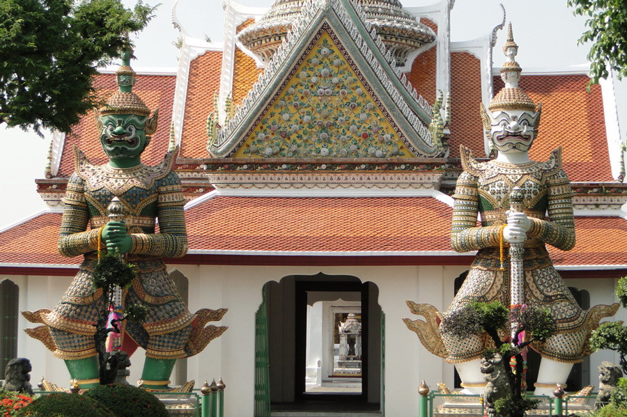 The demon guardians at Wat Arun are imposing and mythical figures stationed prominently at the entrance of the temple