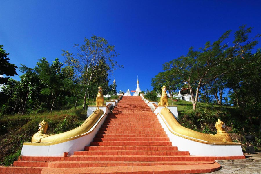 The Naga Staircase at Wat Phra That Doi Kong Mu is a distinctive feature leading to the temple grounds