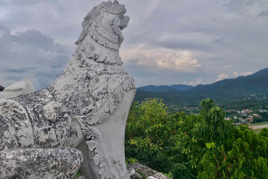 The panoramic viewpoint at Wat Phra That Doi Kong Mu in Mae Hong Son offers breathtaking views of the town and the surrounding landscapes