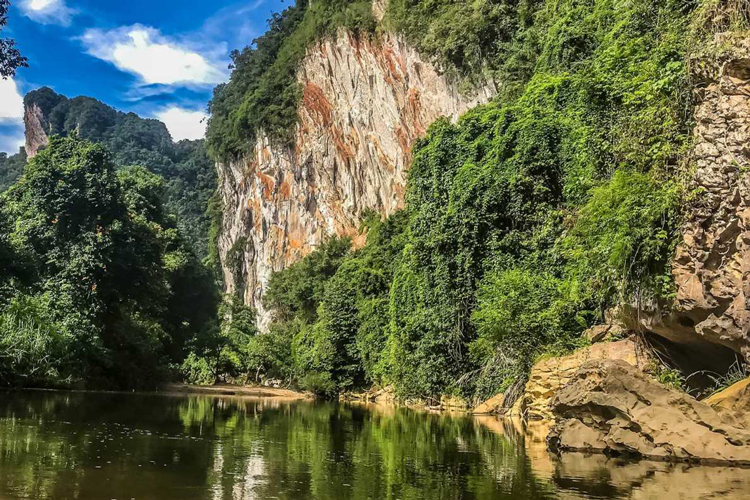 Exploring Khlong Phanom National Park by waterway offers a captivating adventure through its diverse landscapes