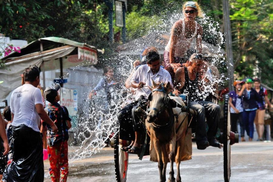 Water splashing activity is the highlight of the festival