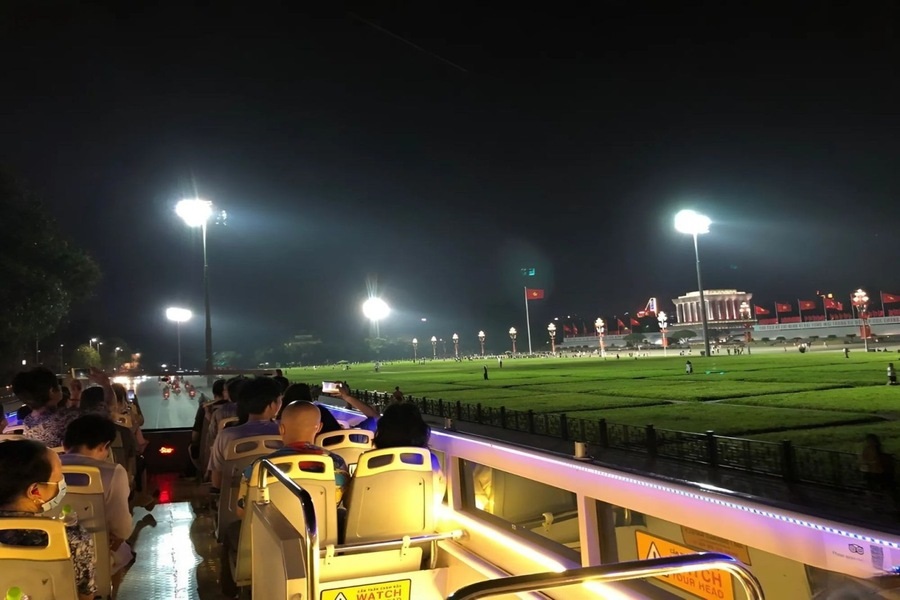 A night bus tour takes visitors past the Ho Chi Minh Mausoleum. Photo: vn-sightseeing