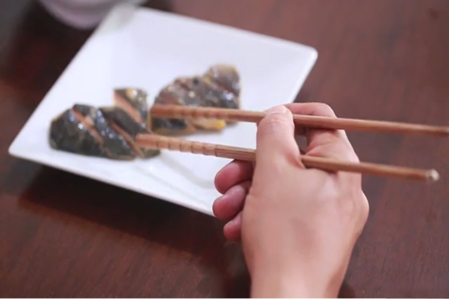 Use the wider end of your chopsticks if you want to pick up food for someone else