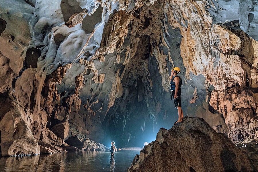 Explore the raw beauty of Toi Cave 