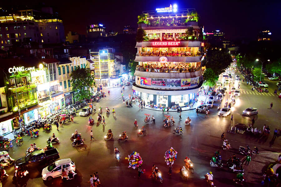 The hustle and bustle of Hanoi continues unabated into the night. Photo: Hanoimoi