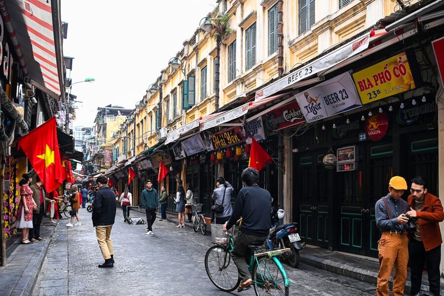 Explore the smallest alley of Hanoi's Old Quarter on a bicycle. Photo: Wiibike