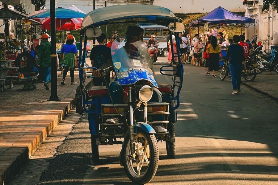 Tuktuk is one of means of transportation when you go on a honeymoon tour in Laos