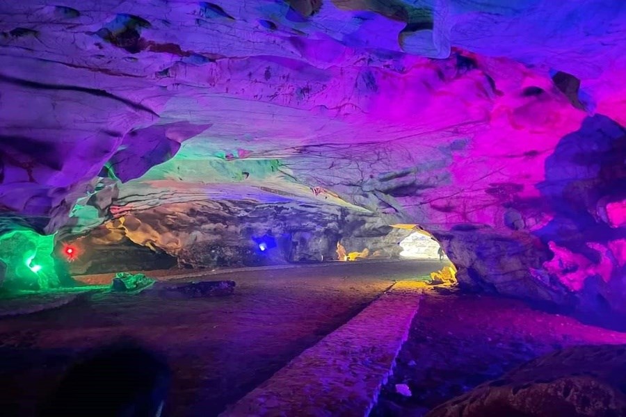 Inside Nang Tien Cave is illuminated by shimmering lights