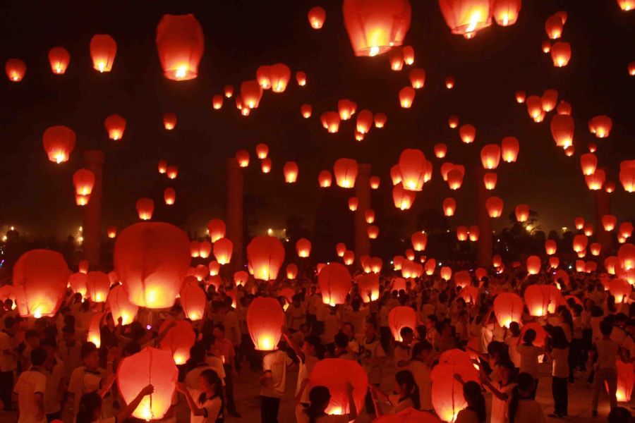 People release lanterns to celebrate this holiday