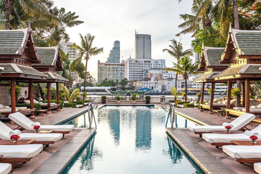 Relax by the pool at Peninsula Bangkok