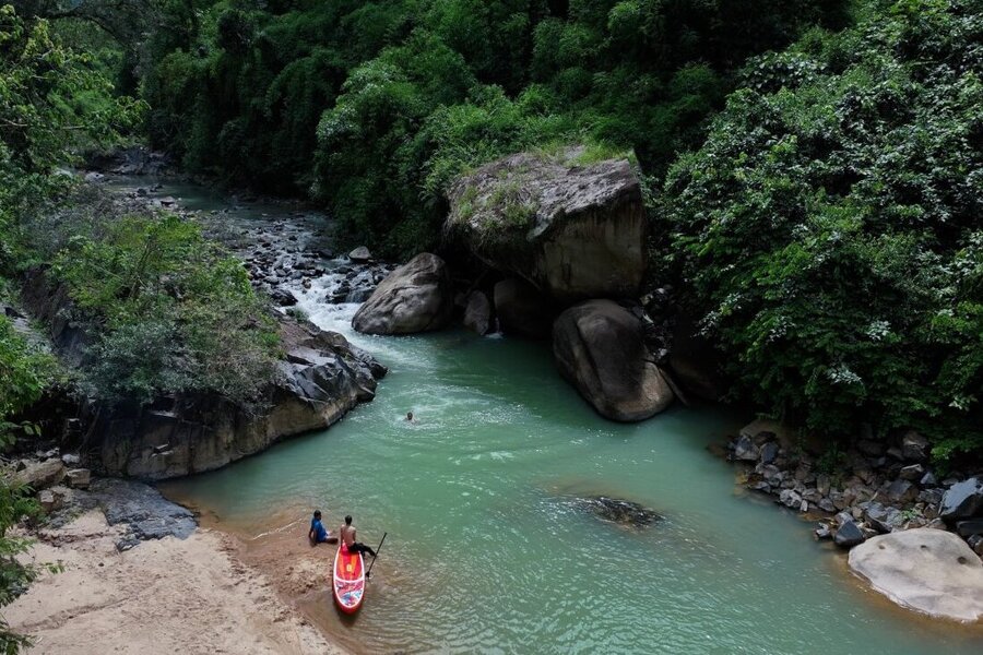 Da Huoai River runs through Madagui. Photo: Travelteam.vn