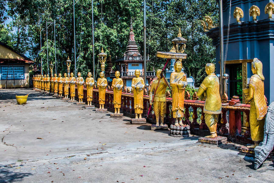 Buddha statues at Wat Kraom. Photo: Ted McGrath