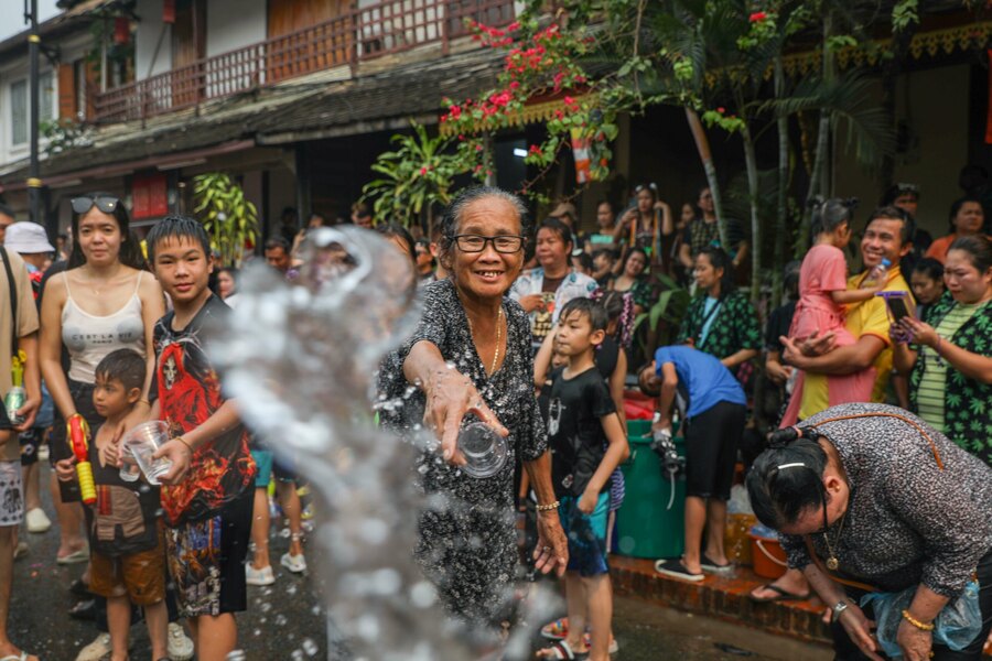 Lao people send you their best wishes through water. Photo: Southeast Asia Globe