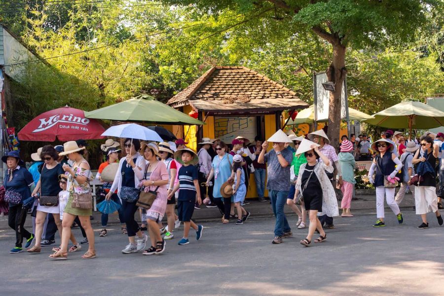 Tourists are visiting the village and the handicraft houses