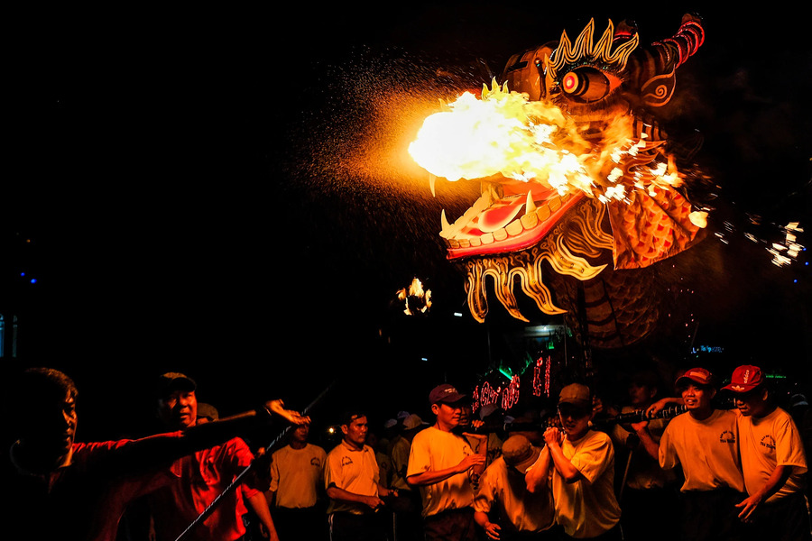 The most impressive sight for visitors at the festival is the dragon model breathing fire. Photo: Dan Viet