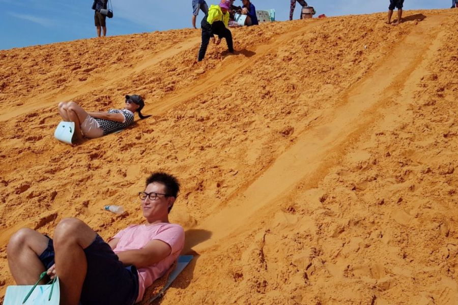 Sandboarding in Phuong Mai Sand Dunes