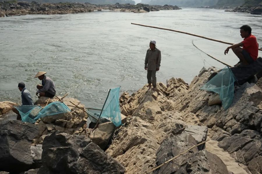 Village fishermen doing their job at sunset