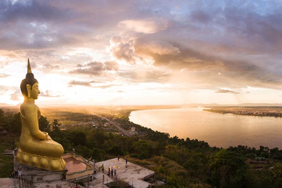 The Golden Buddha located on a hilltop overlooking Pakse city