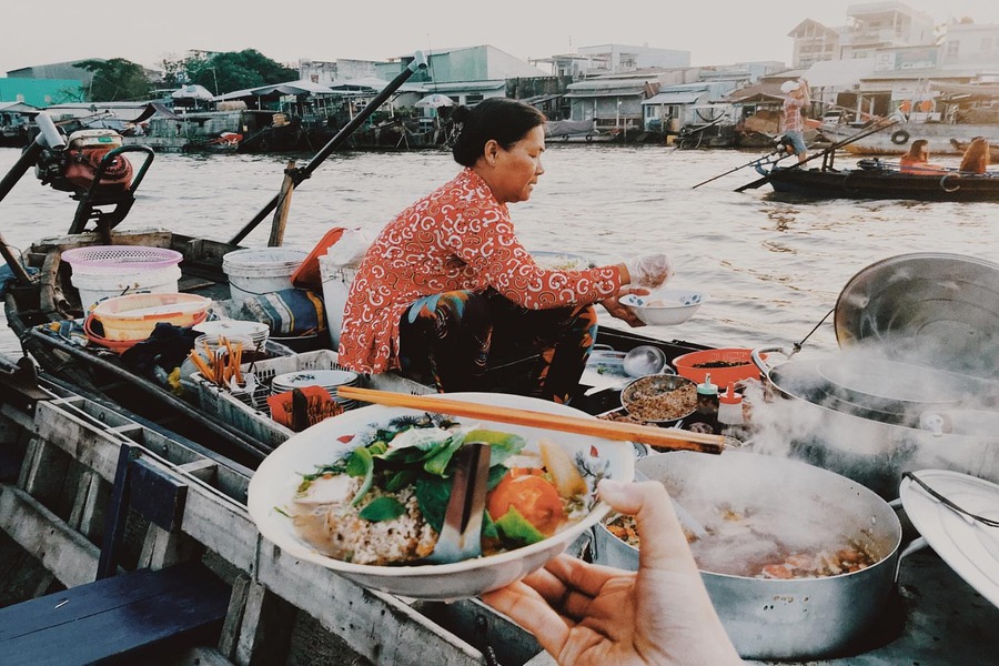 Enjoy a steaming bowl of noodle soup right on the boat