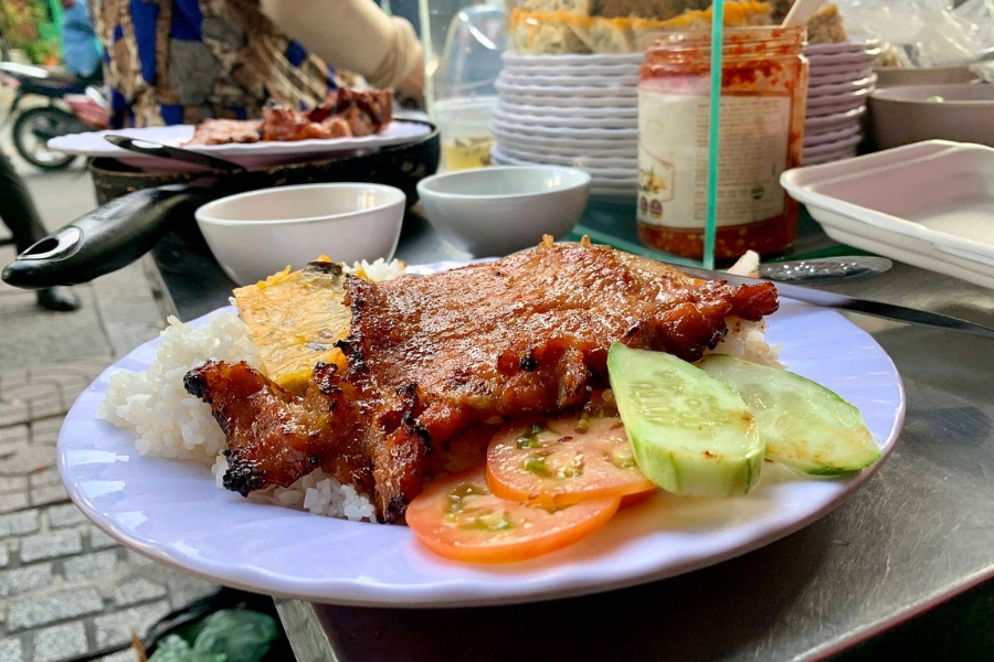 From a cheap street food dish, com tam has become a specialty of Ho Chi Minh City