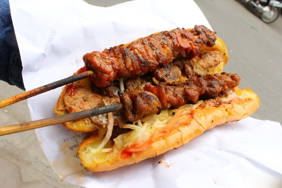 Banh mi thit xien (bread with meat skewers) is also a famous street food in Hanoi