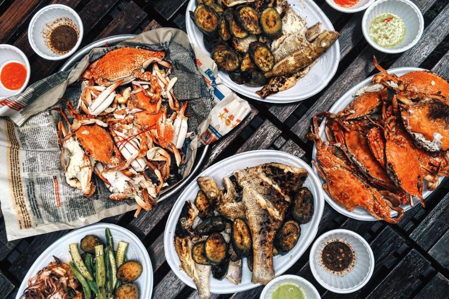 Enjoying fresh seafood at Dam Trau Beach