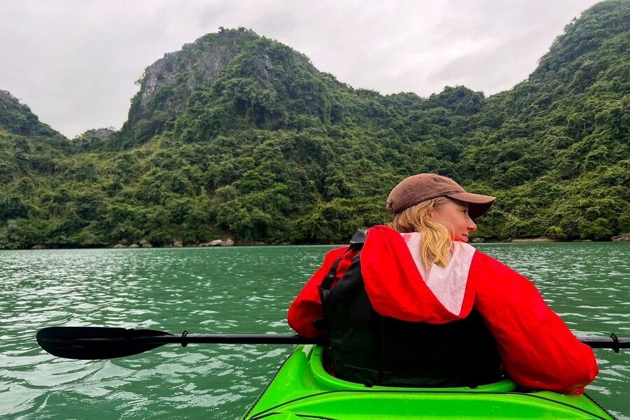 You can paddle a boat into the caves under islets. Photo: Tripadvisor