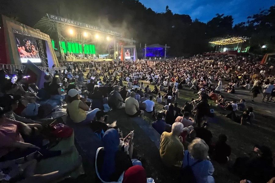 Local people and tourists eagerly attend the concert