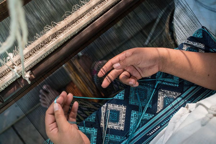 Visitors can explore Laos through textiles throughout the Living Crafts Center